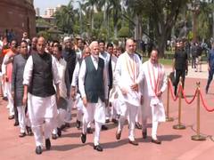 
      
      Led by PM Modi, MPs walk to new Parliament building
      
      