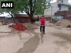 
      
      MP girl who cycles 24 km to school daily, scores 98.5 pc in...
      
      