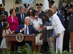 
      
      Biden signs bill awarding Congressional Gold Medal to Jan 6...
      
      