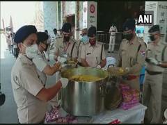 
      
      Railway Protection Force personnel distributes food to needy...
      
      