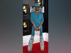 
      
      Lil Nas X, Billy Porter raise glamour quotient at Grammy red...
      
      