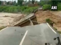 
      
      Bridge collapses after heavy rain in Jammu's Gadigarh 
      
      
