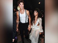 
      
      Shawn Mendes, Camila Cabello cuddle in his hometown 
      
      