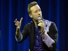 
      
      Chris Martin's rep denies that singer kissed Dua Lipa 
      
      