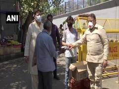 
      
      Congress workers distribute food packets among needy in Delhi
      
      