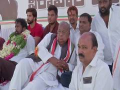 
      
      Telangana: Cong leader along with party workers protest...
      
      
