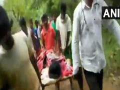 
      
      Andhra villagers carry ailing youth for 12 km to reach ambulance
      
      
