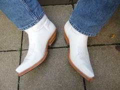 
    White is the new black for men's footwear
    