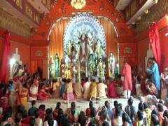 
      
      Delhi: Thousands of devotees throng CR Park pandal on Durga...
      
      