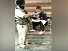 
      
      CRPF man commended for feeding specially-abled boy
      
      
