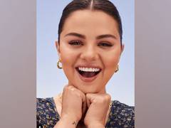 
      
      Here's a closer look at Selena Gomez's dripping rose tattoo
      
      
