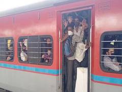 
      
      Migrant labourers leave Mumbai in packed trains fearing lockdown
      
      