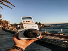 
      
      Fujifilm introduces new film-digital hybrid Instax Mini Evo camera
      
      
