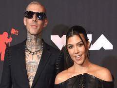 
      
      Kourtney Kardashian, Travis Barker get married for third time
      
      