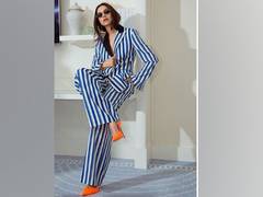 
      
      Pop of orange and neon for Deepika Padukone on day 2 of Cannes
      
      