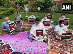 
      
      8 suspended Rajya Sabha MPs on indefinite dharna in...
      
      