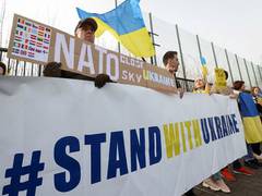 
      
      Ukrainians hold large protest in Brussels
      
      