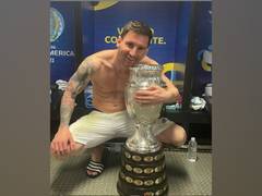 
      
      Messi's picture holding Copa America trophy becomes...
      
      