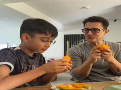 
      
      Aamir Khan relishes mangoes with son Azad Rao
      
      
