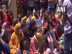 
      
      Kashmiri Pandits protest against Rahul Bhat's killing in Budgam
      
      