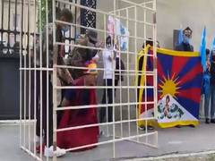 
      
      Ethnic groups stage protest in Paris against China's abusive...
      
      