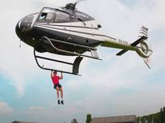 
      
      YouTubers smash Guinness World Record for 25 helicopter pull-ups
      
      