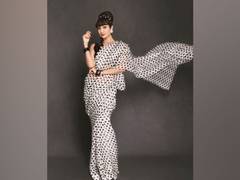 
      
      Shilpa Shetty sports retro look, pays tribute to 'her fashion...
      
      