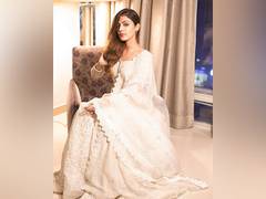 
      
      Rhea Chakraborty looks gorgeous in white lehenga 
      
      