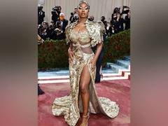 
    Megan Thee Stallion dons golden ensemble for Met Gala 2022
    