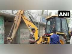 
      
      UP: Bulldozers raze illegal properties of Kanpur gangster 
      
      