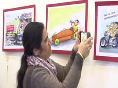 
      
      Cartoonists from 39 countries exhibit works themed on road...
      
      