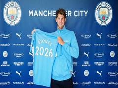
      
      John Stones extends stay with Manchester City, signs...
      
      
