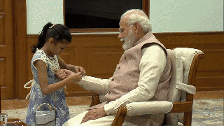 
      
      Daughters of PMO staff celebrate Raksha Bandhan with PM Modi
      
      