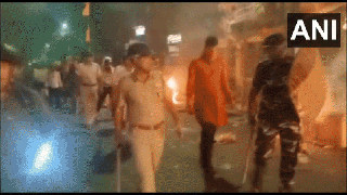 
      
      West Bengal police conduct flag march in Howrah after violence
      
      