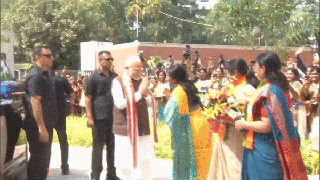 
      
      PM Modi stops BJP Mahila Morcha chief from touching his feet
      
      