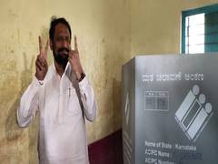 
      
      K'taka by-polls: Deputy CM Laxman Savadi casts his vote at...
      
      