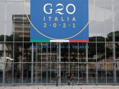 
      
      Police force away protesters blocking access to G20 Summit...
      
      