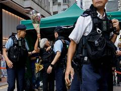 
      
      China's paranoia targets all dissent, even T-shirts and books
      
      