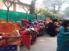 
      
      Delhi govt school students in colourful clothes wait to greet...
      
      