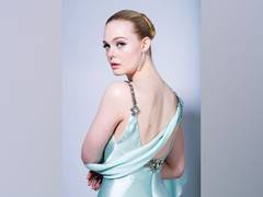 
    Elle Fanning channels her modern-day Cinderella at 2021 Golden Globes
    
