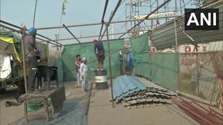 
      
      Farmers at Singhu border remove tents from protest site,...
      
      