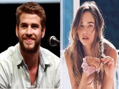 
      
      Liam Hemsworth hits the beach with girlfriend Gabriella Brooks
      
      