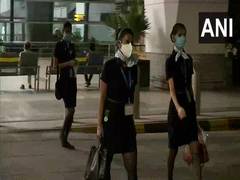 
      
      'Work comes first': Flight attendants back to duty as...
      
      