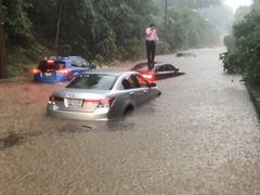 
      
      Roads become rivers as Washington deals with flash floods
      
      