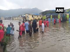 
      
      Thane police rescues people stranded in flood water
      
      