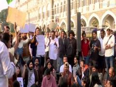
      
      Students continue protest at Gateway of India in solidarity...
      
      