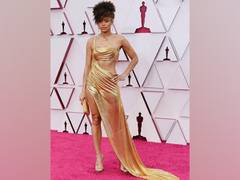 
    Andra Day stuns in metallic Oscars gown, pays tribute to Billie Holiday
    