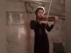 
      
      Girl hiding in bomb shelter plays song by Ukrainian composer...
      
      