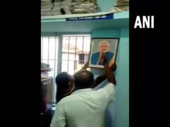 
      
      BJP lodges complaint with TN police over removal of PM photo
      
      