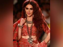
    Lakme Fashion Week: Genelia D'Souza makes comeback after 5 years
    